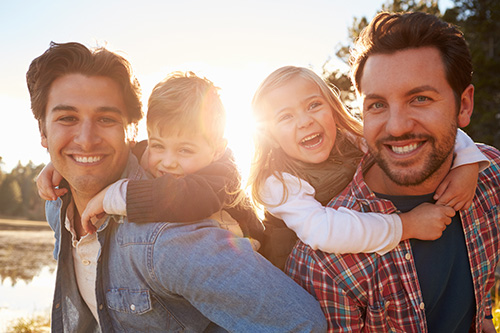 Gay male couple with children